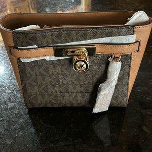 Michael Kors, Hamilton traveler